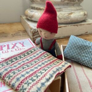 Red Hat Elf Doll with Cozy Bedding